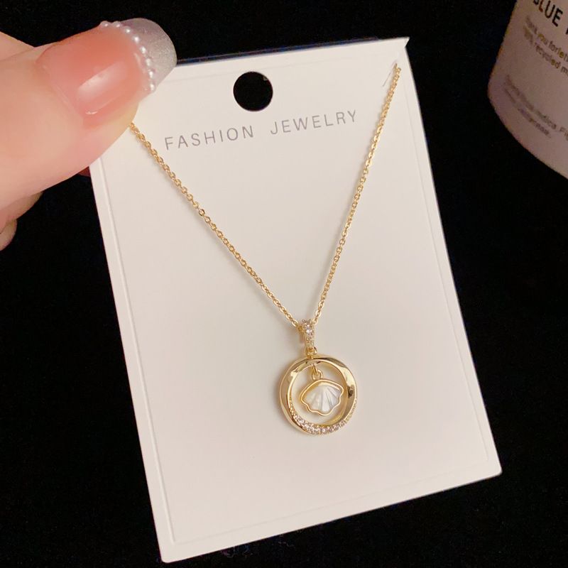 Shining Elegance: Charming Zircon Circle and Scallop Necklace