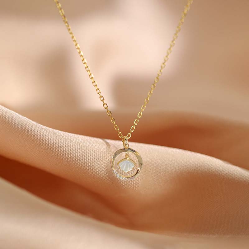 Shining Elegance: Charming Zircon Circle and Scallop Necklace