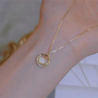 Shining Elegance: Charming Zircon Circle and Scallop Necklace