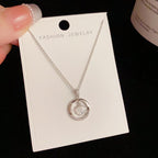 Shining Elegance: Charming Zircon Circle and Scallop Necklace